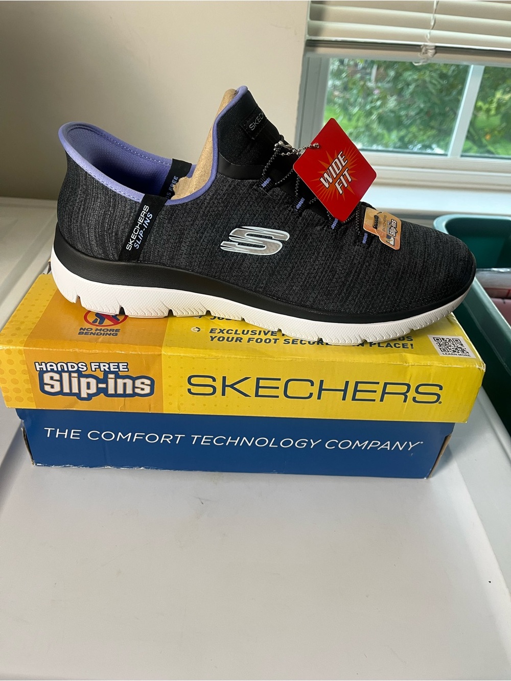 Skechers Women's Black Slip-In Sneaker - Wide Fit